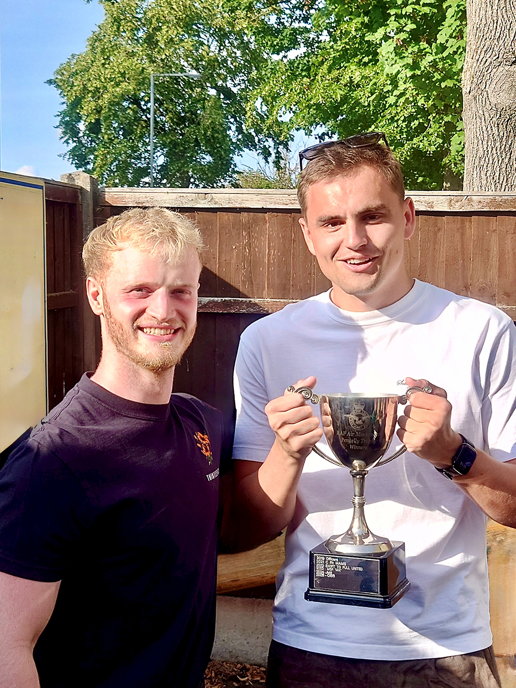 Smiling members of Movements Conversion Unit, proudly display the Pengelly Cup for the first time.